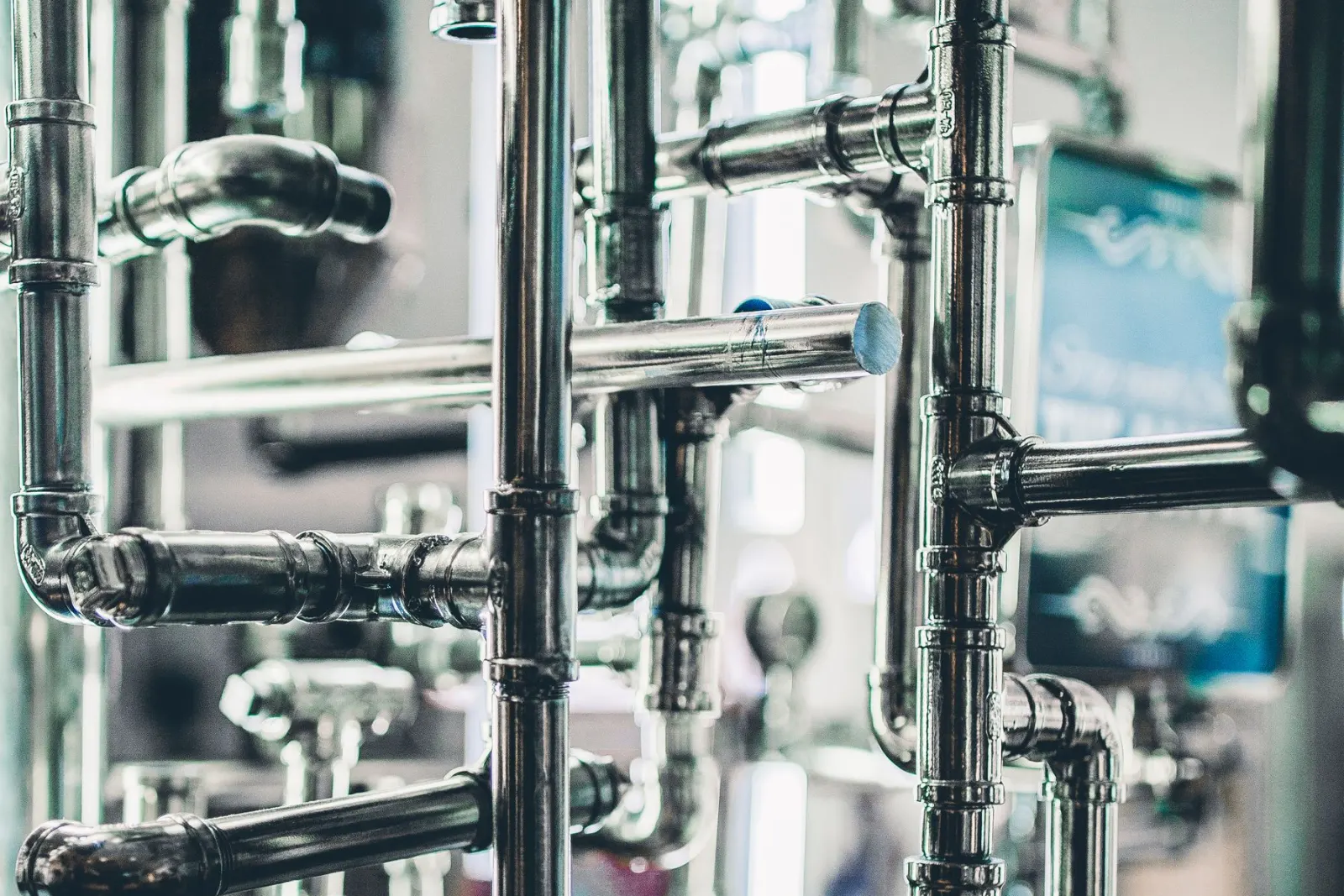 A plant room with runs of pipework and valves