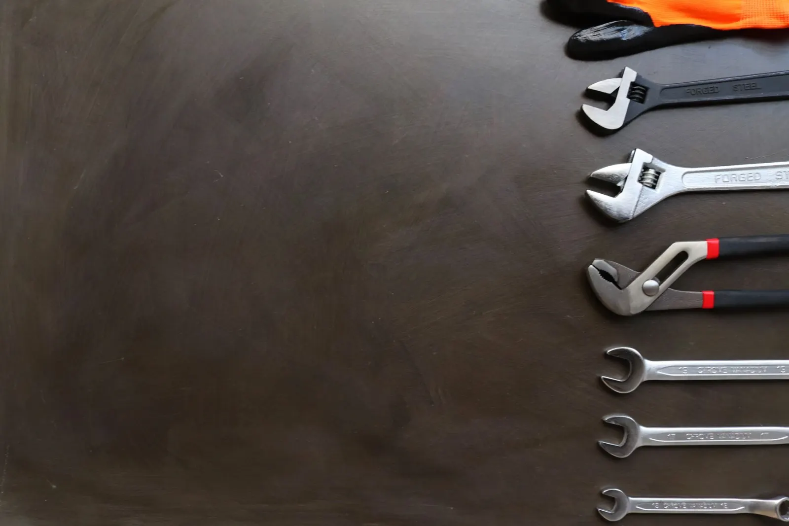 Adjustable spanners laid out ready for a job