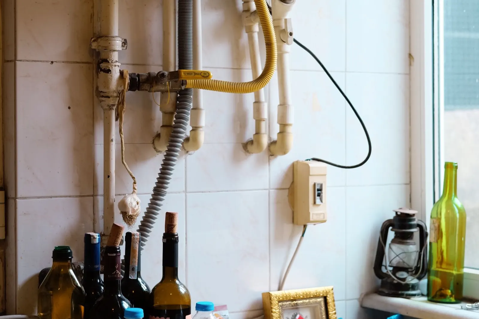 Copper pipework running to a wall-mounted appliance